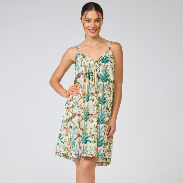 Woman wearing a floral dress on a white background