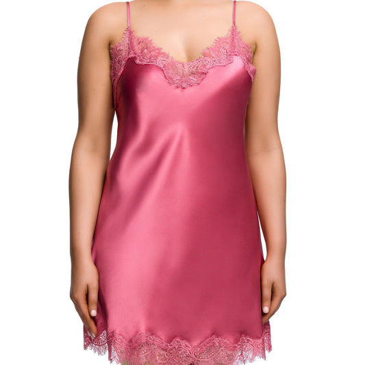 Pink satin nightgown with lace details on a white background